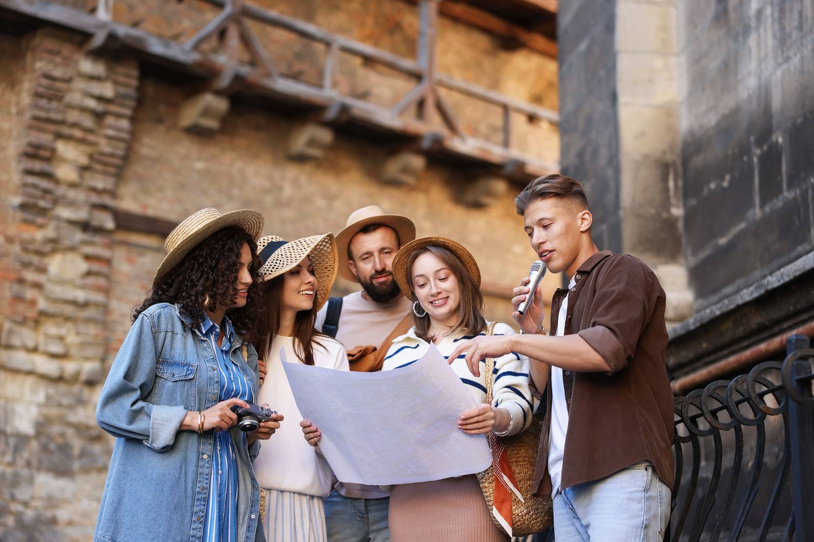 Guide and group reviewing a map